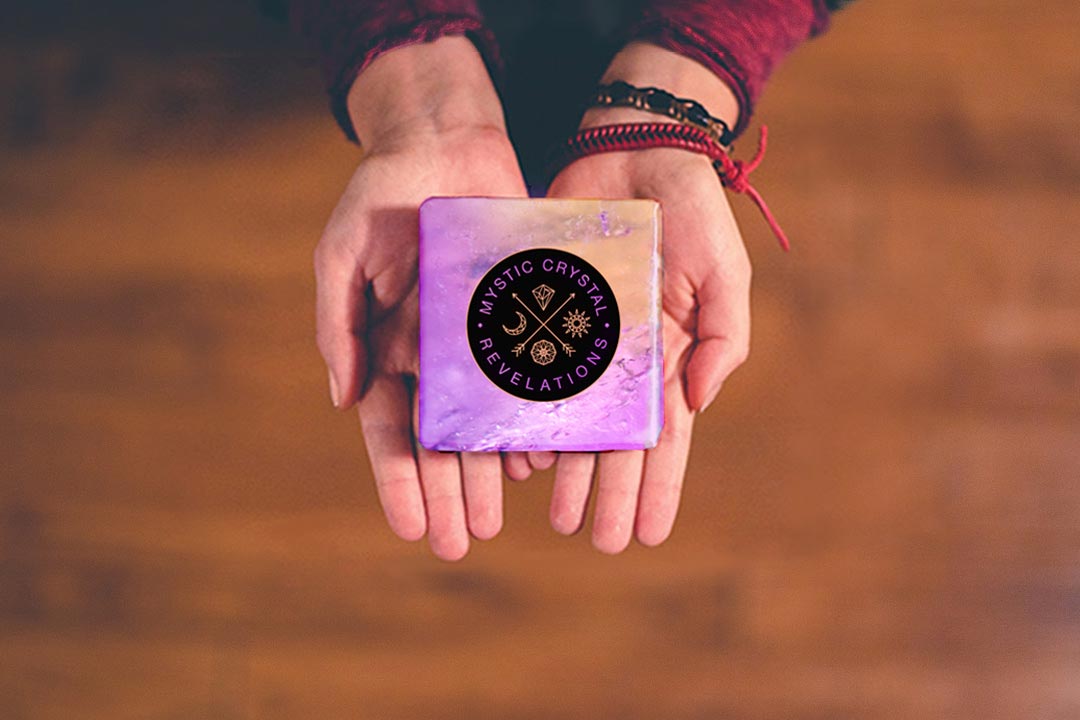 Mystic Crystal Revelations symbol on a gift box of Ametrine for home page