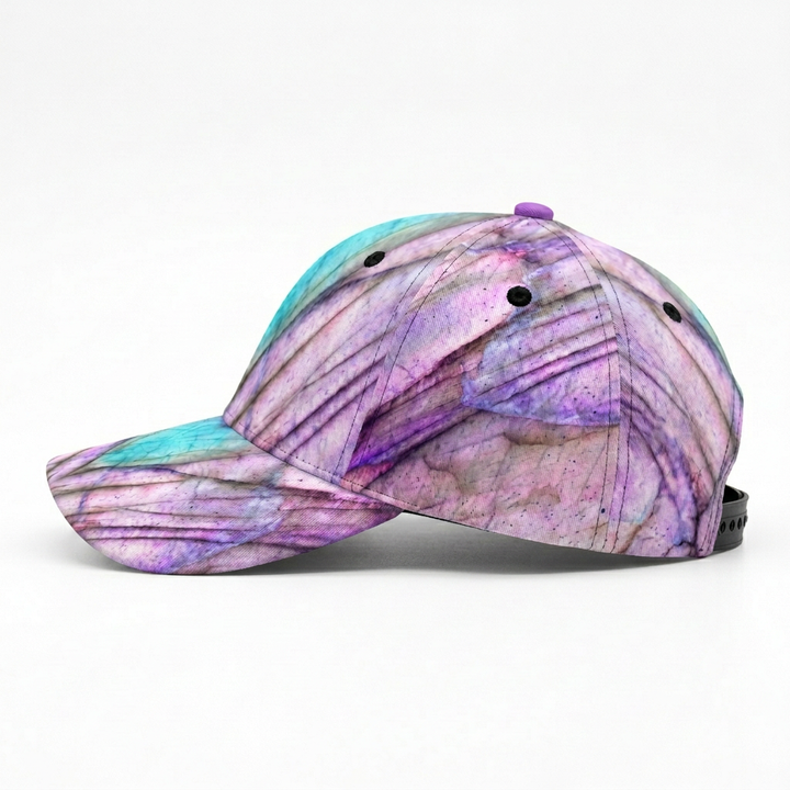 Side-view cap with black plastic snapback strap on white